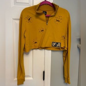 LF the brand mustard yellow distressed crop sweatshirt.